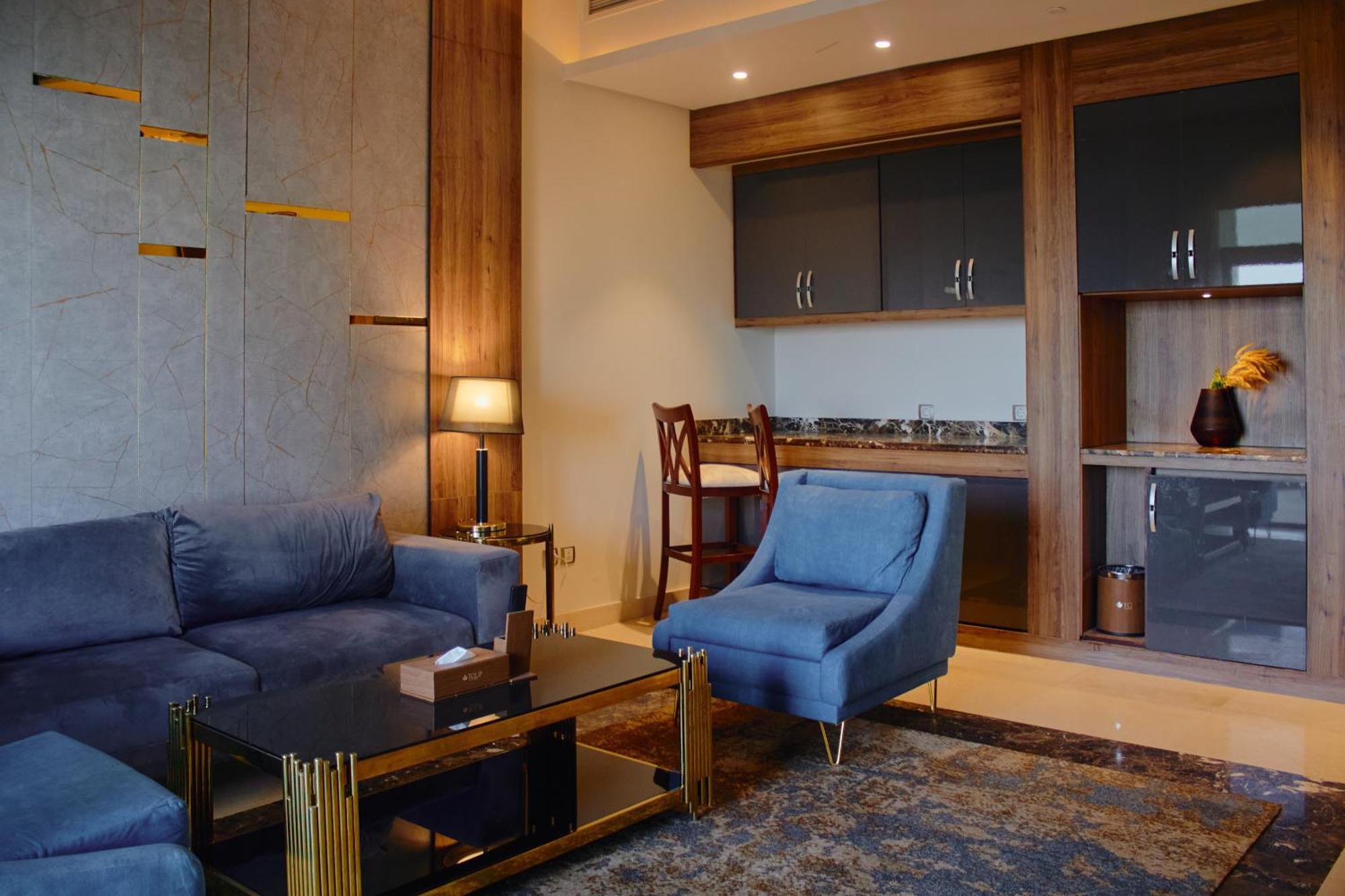 Tolip Resort El Galala Hills Ain Sukhna Exterior foto A living room in a suite at the hotel